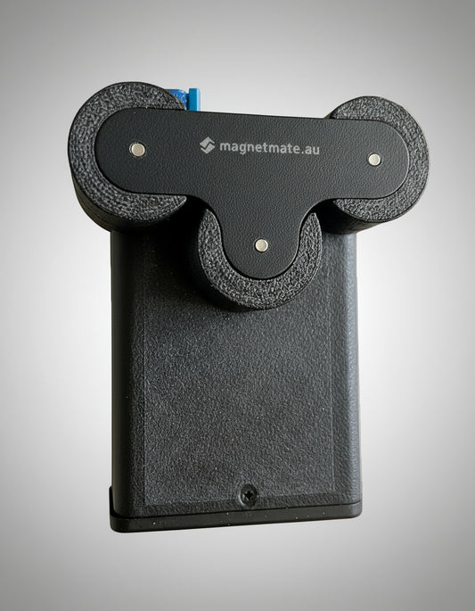 Black magnetic strip holder with 'magnetmate.au' branding on a white background