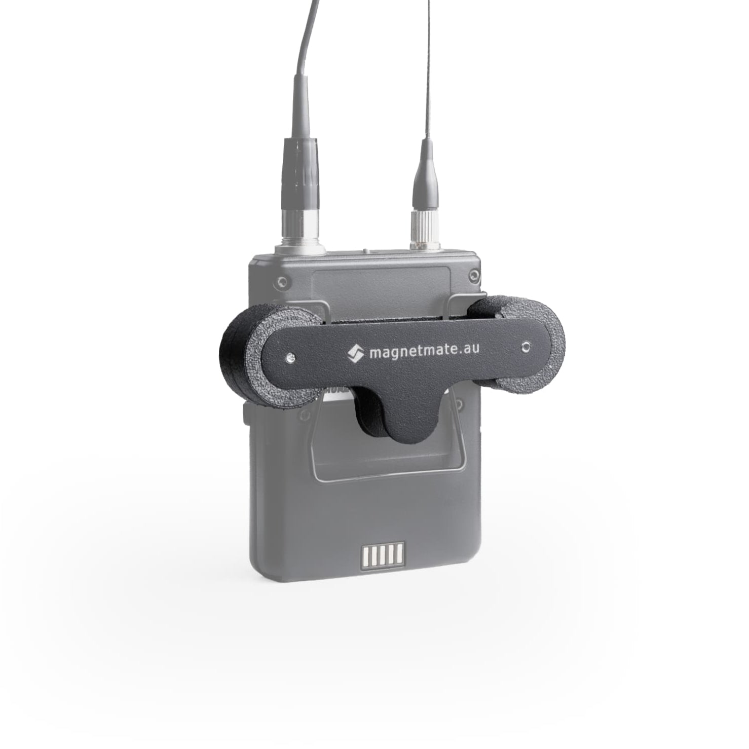 Gray electronic device with antenna and magnetmate clip attached on a white background