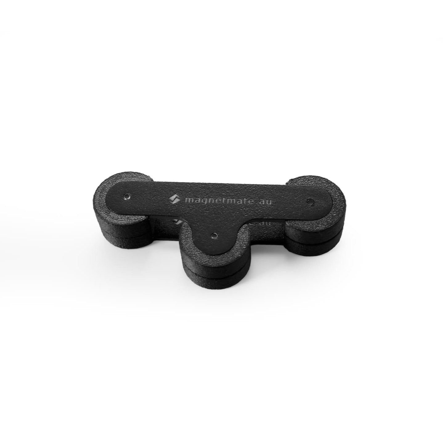 Black metal magnet on a white background